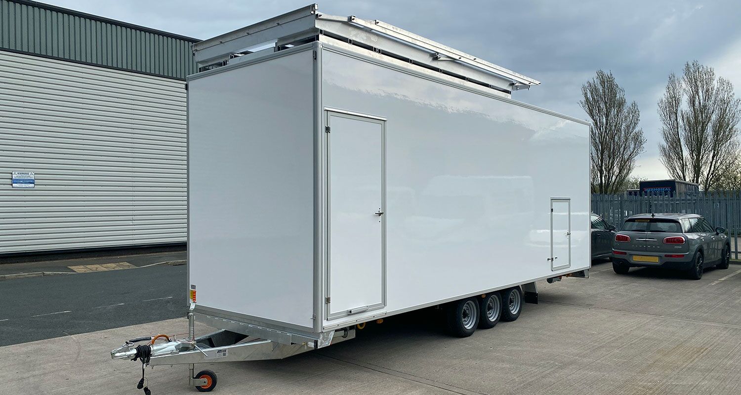 setup with electro hydraulic handrails enclosed space trailer